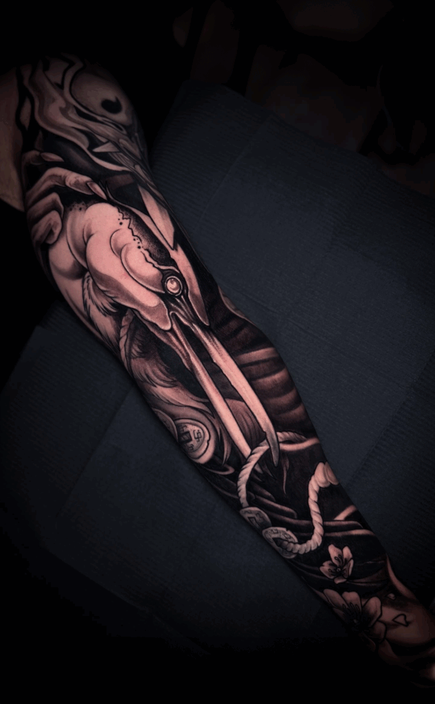 organic dark heron fullsleeve blackwork tattoo