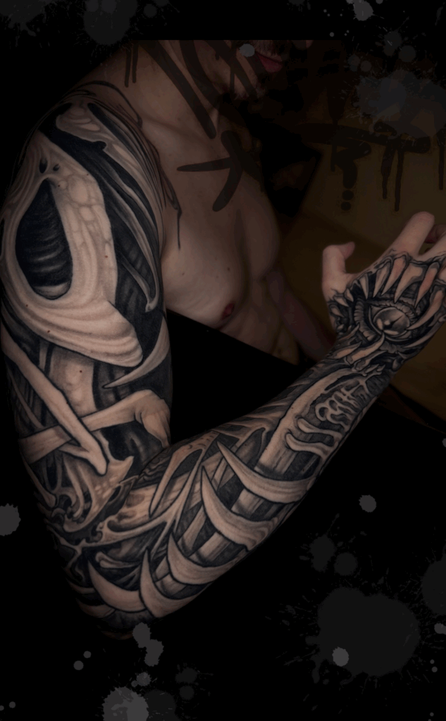 fullsleeve darkart surreal blackwork tattoo