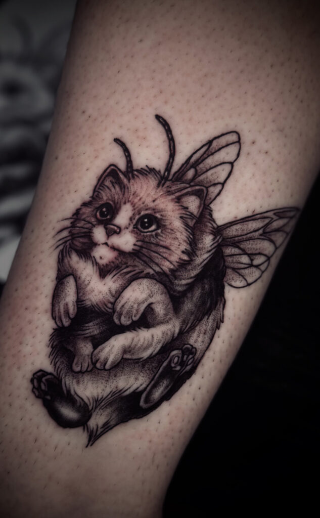 cat bee surreal cute little blackwork tattoo