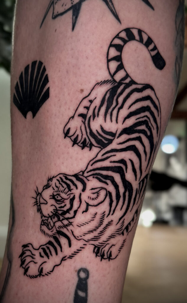 tiger old school traditional blackwork tattoo