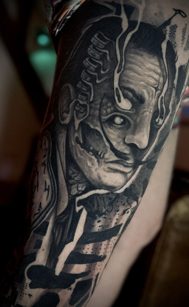 salvador dalí dark surreal blackwork tattoo